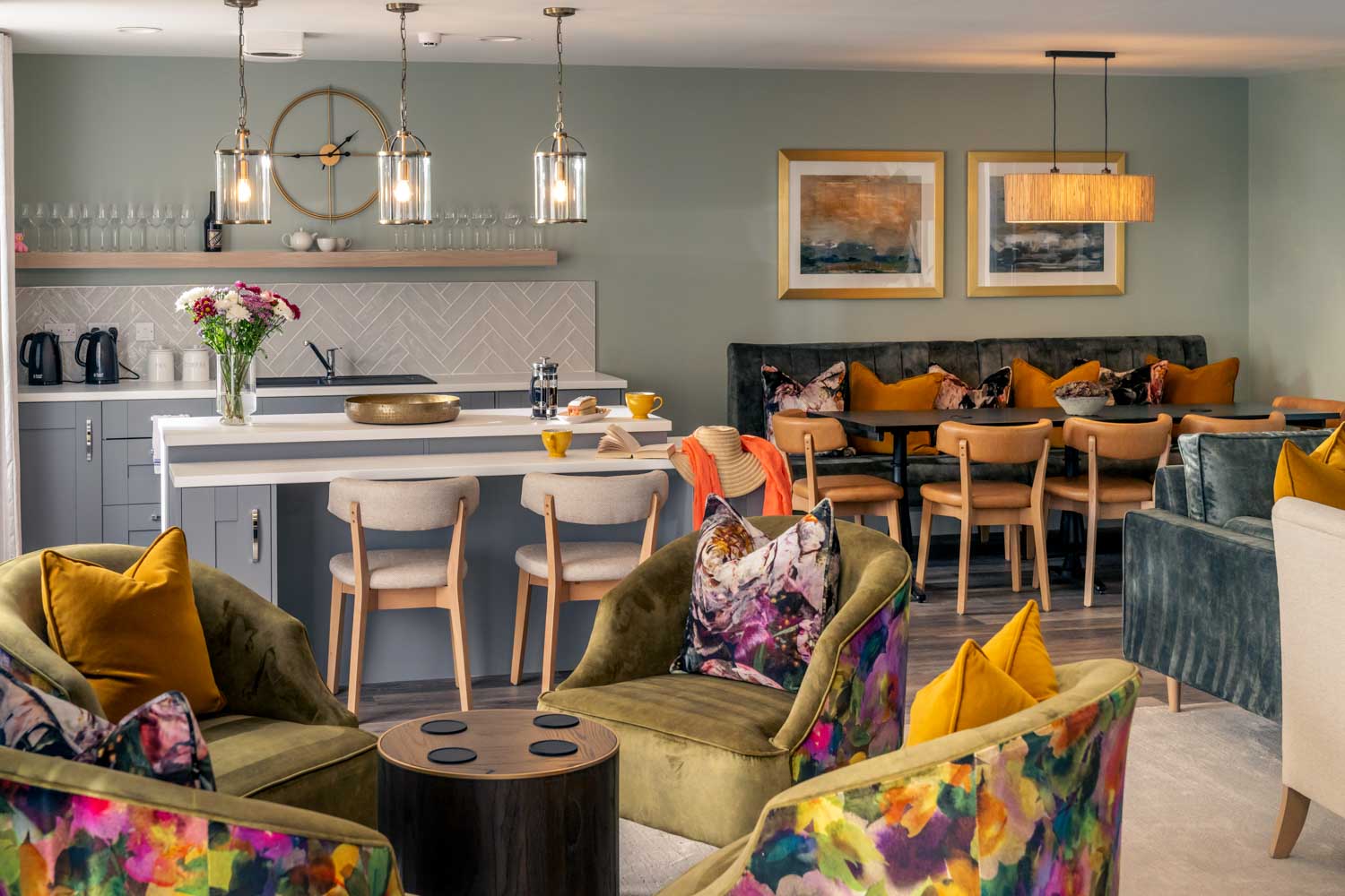 a living room with a kitchen and dining area