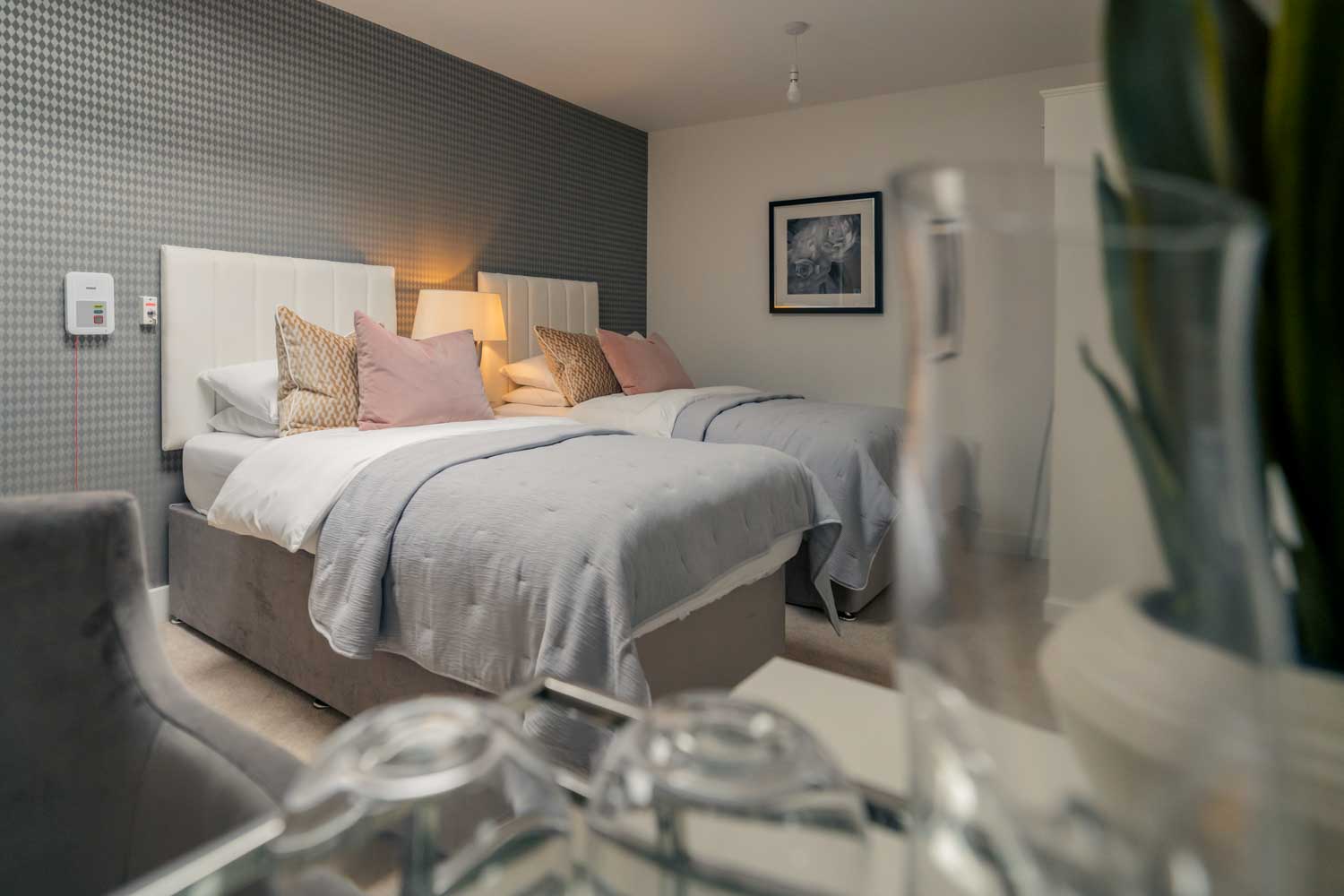 a room with a bed and a chair
