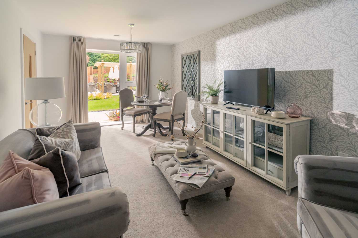 a living room with a large screen