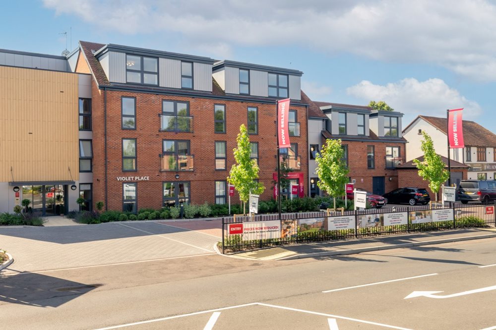 a building with a parking lot
