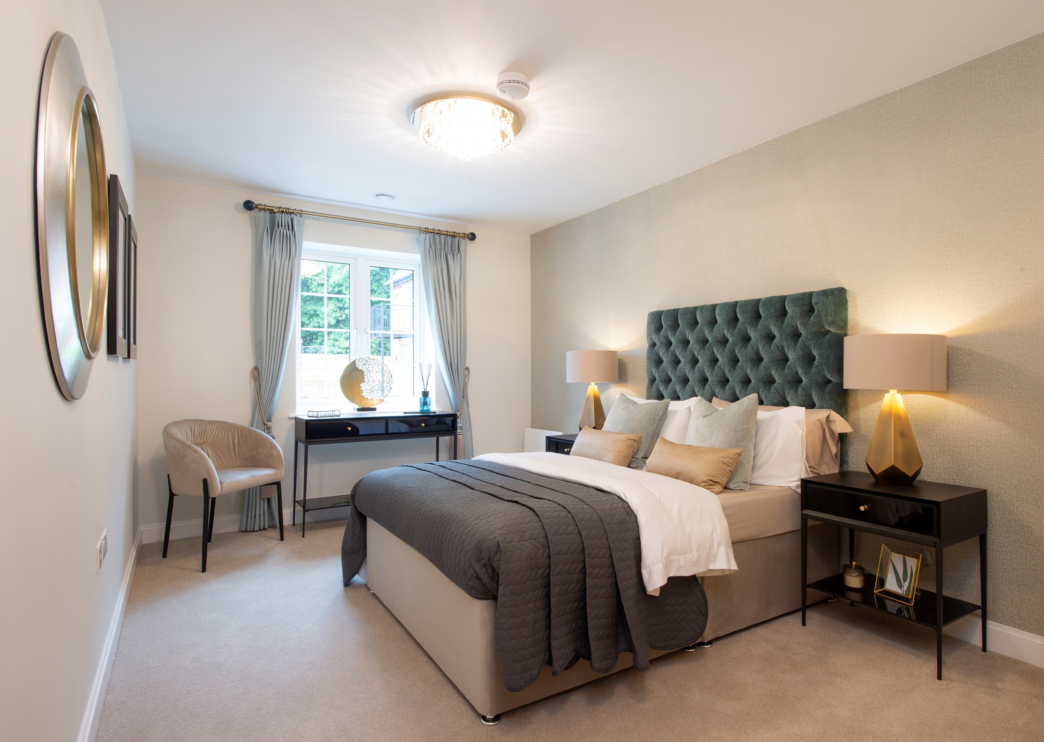 a bedroom with a bed and a desk