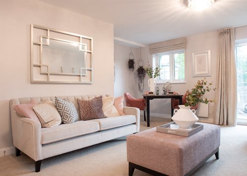 a living room with a couch and a coffee table