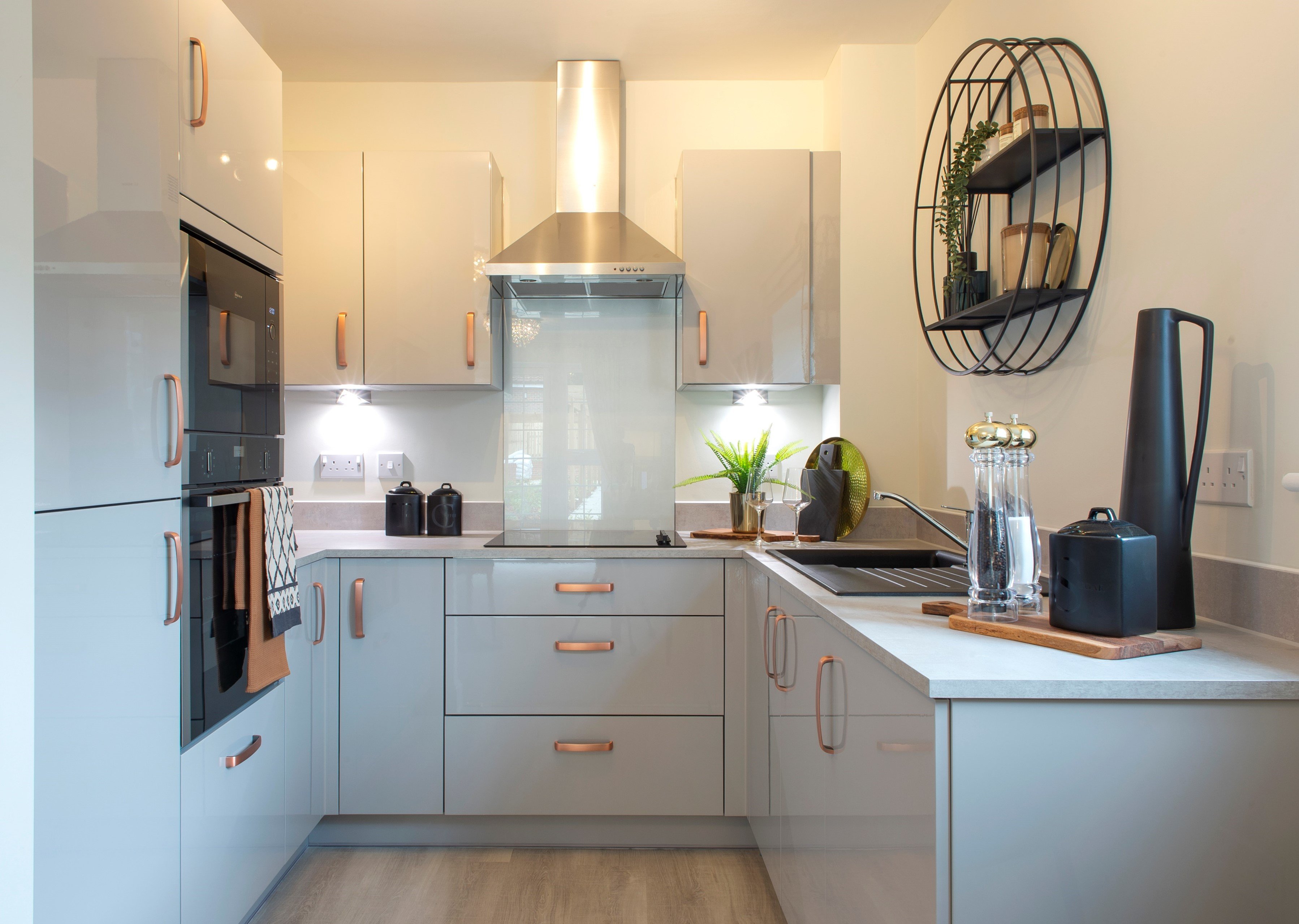 a kitchen with white cabinets