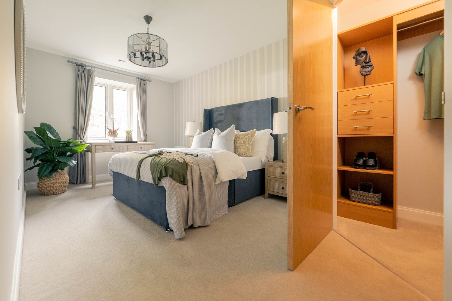 a bedroom with a bed and a shelf