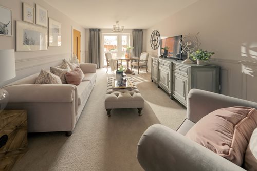 a living room with a couch and a tv