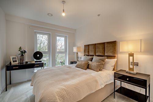 a bedroom with a large bed