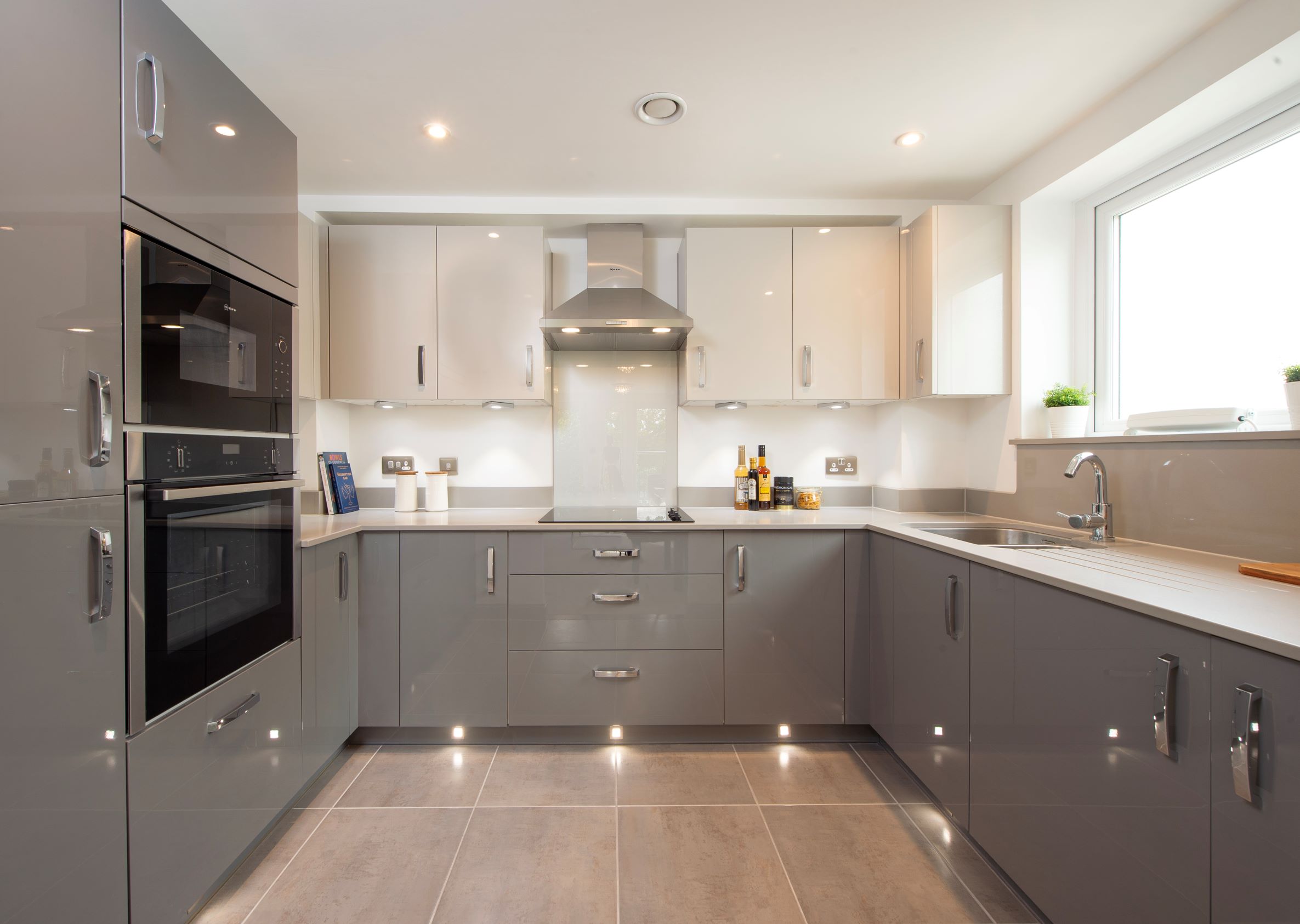 a kitchen with black appliances