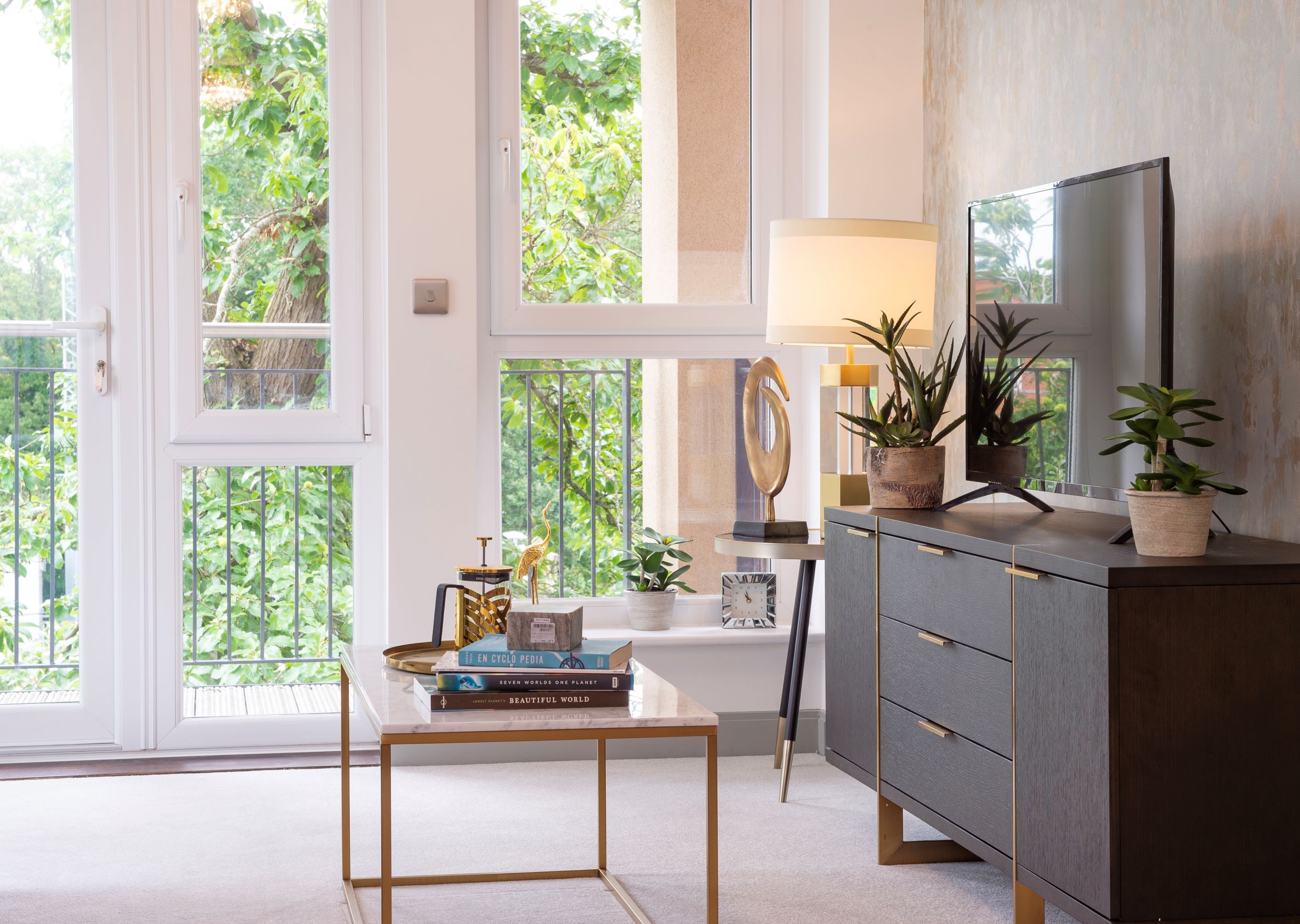 a kitchen with a table and a window