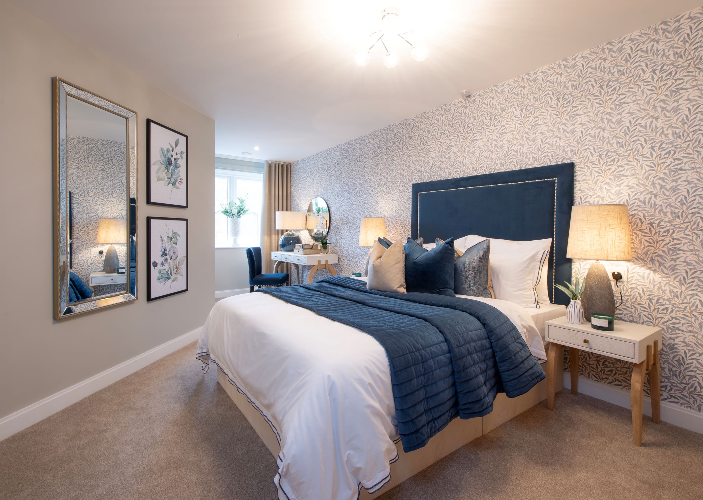 a bedroom with a bed and a mirror