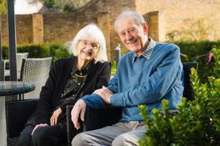 a man and woman sitting together