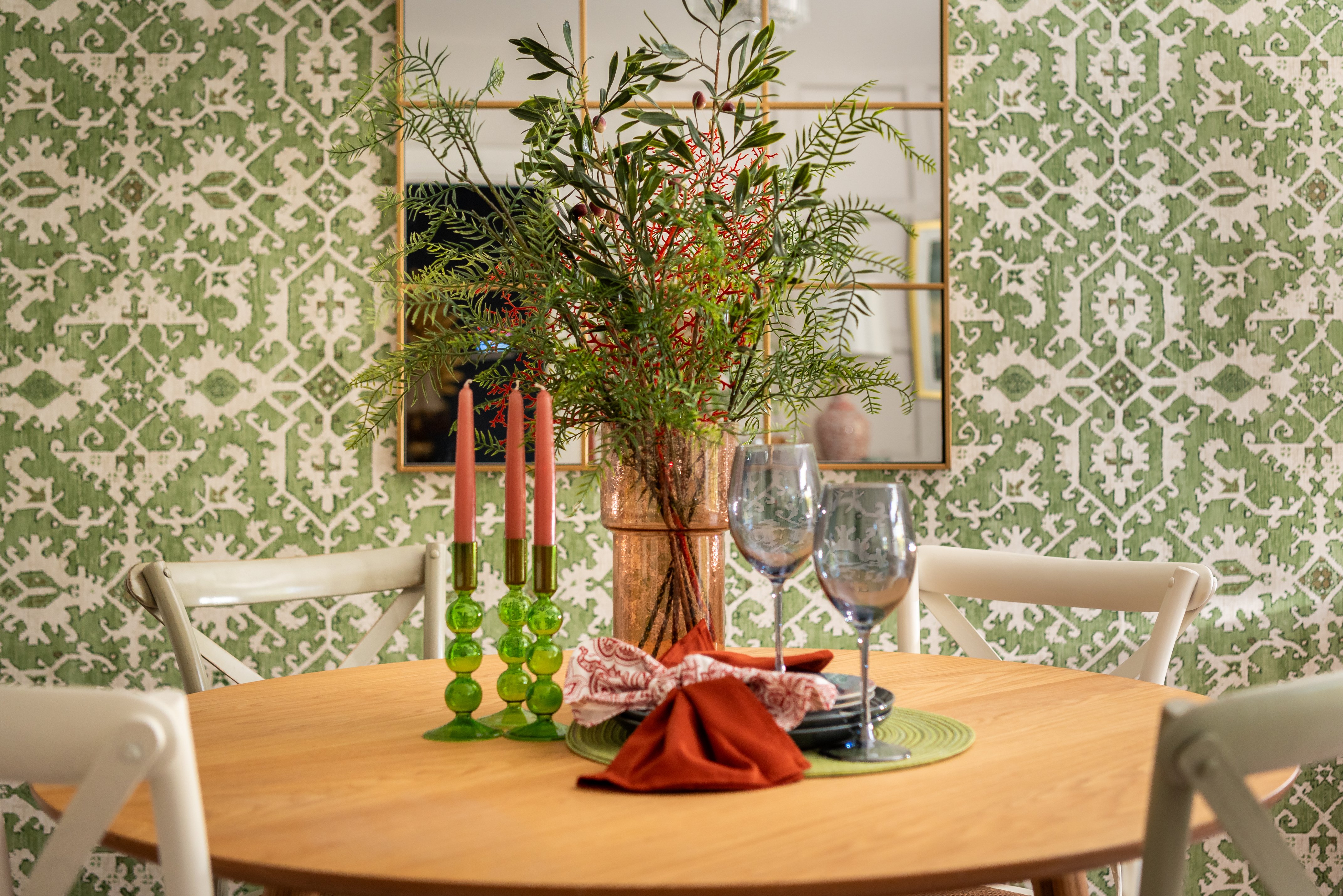 a dining table with flowers