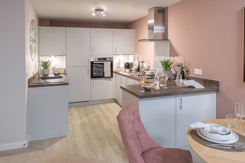 a kitchen with white cabinets