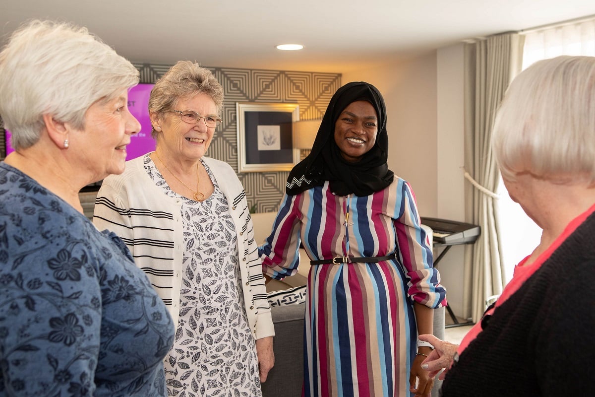 Elderton Place homeowner Gillian Harwood with House Manager Fatima and other homeowners