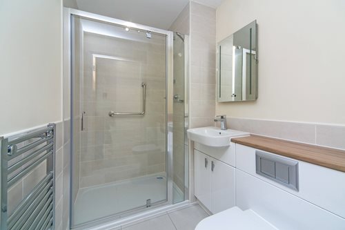 a bathroom with a glass shower
