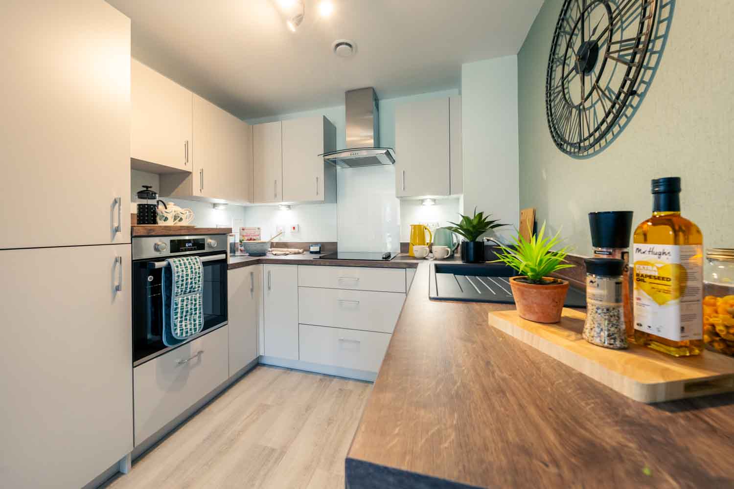 a kitchen with white cabinets