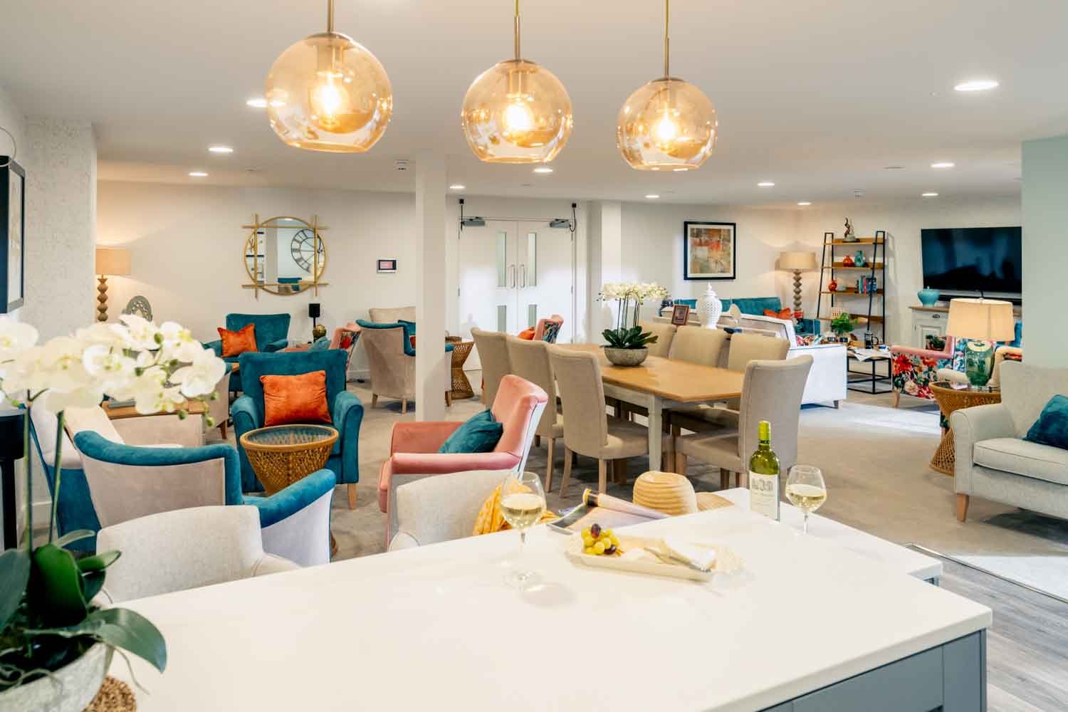 a large room with a table and chairs