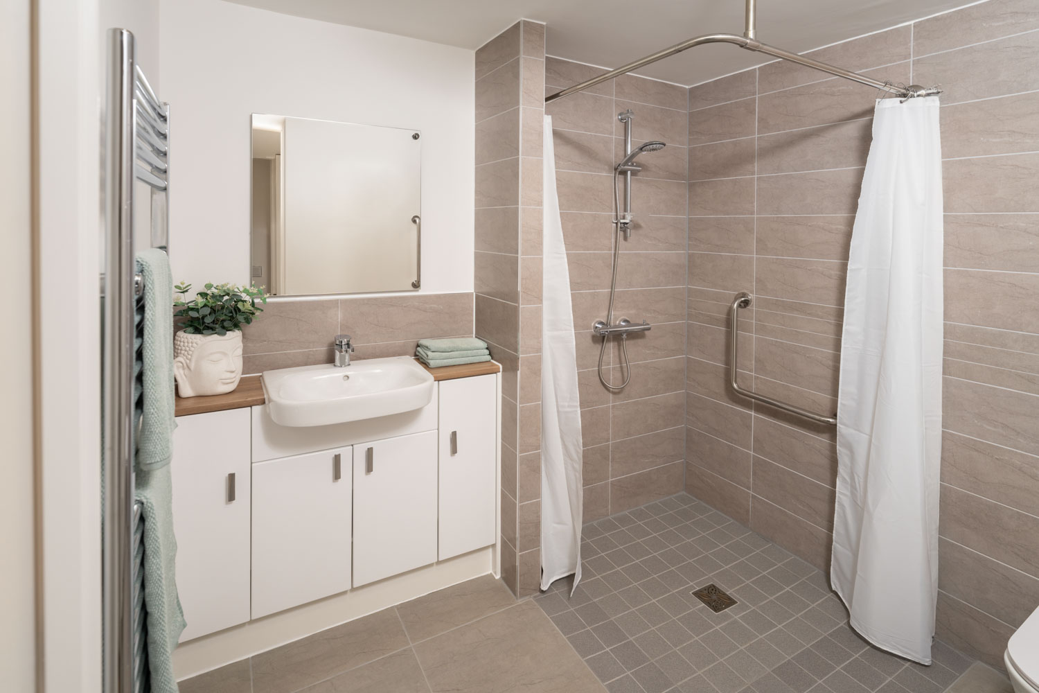 a bathroom with a shower and sink