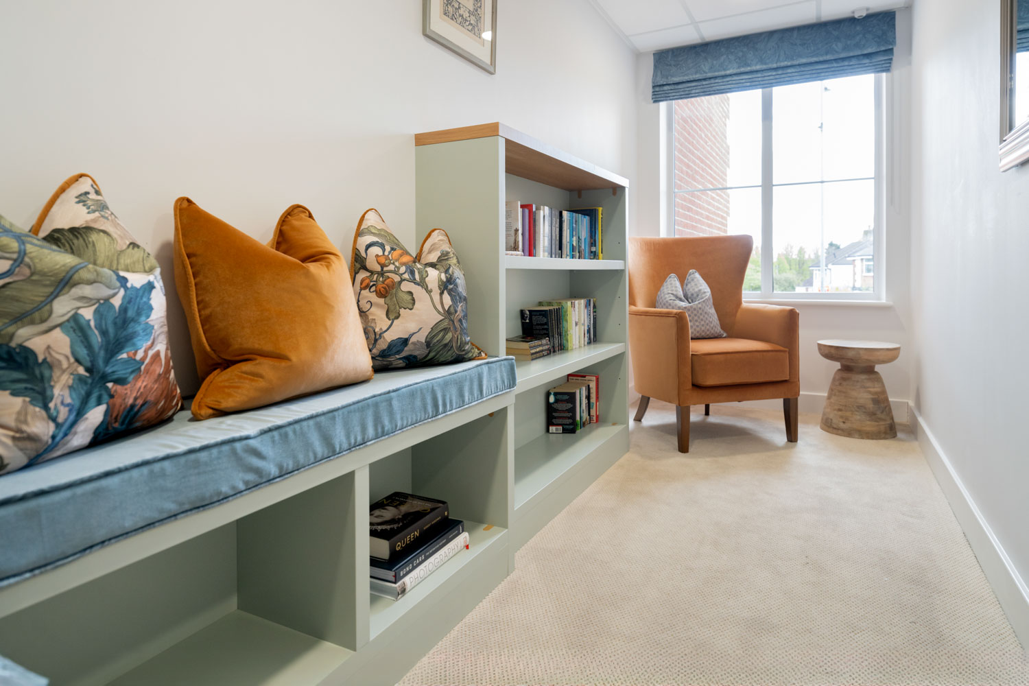 a room with a bed and a chair