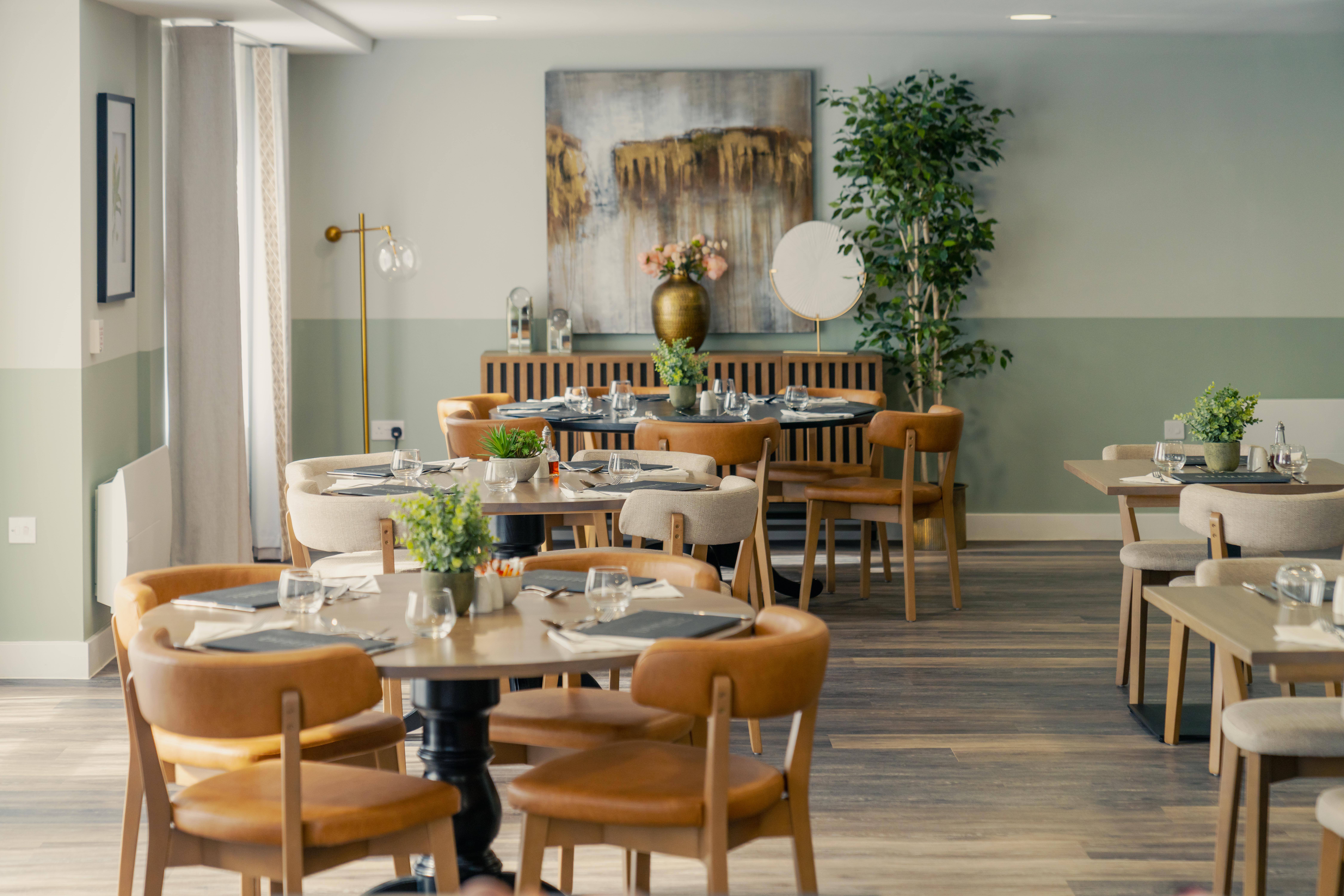 a room with tables and chairs