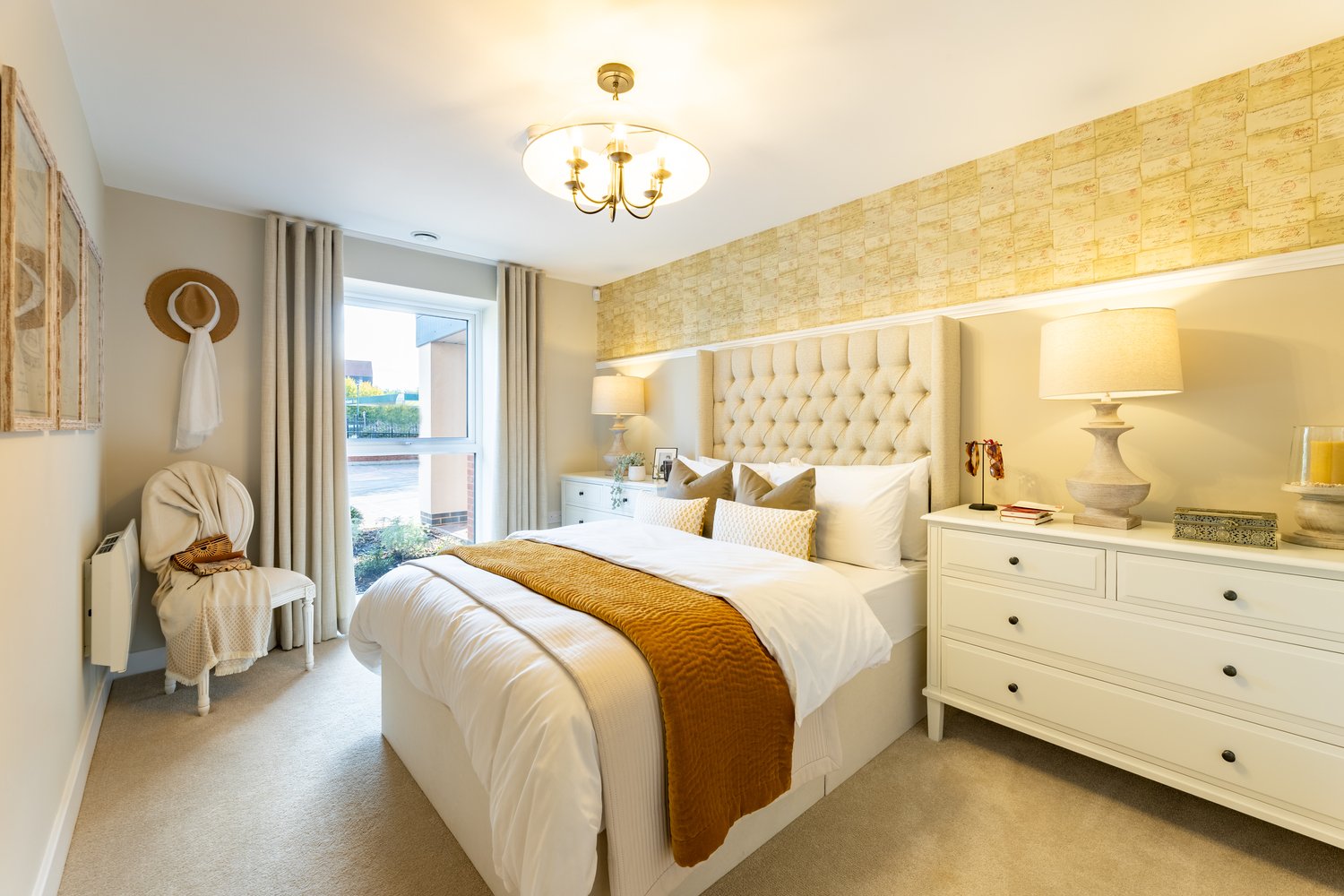 a bedroom with a bed and lamps