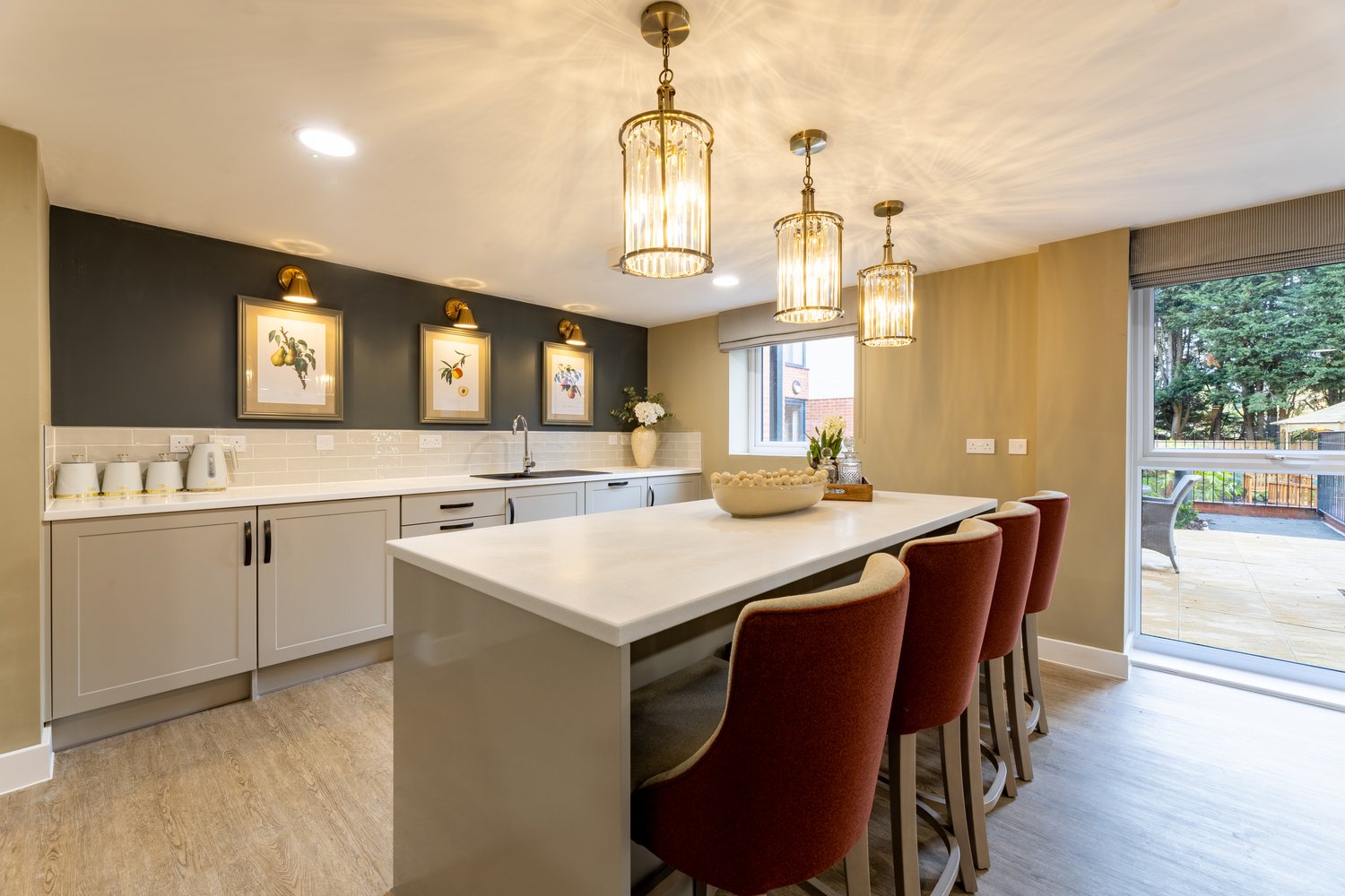 a kitchen with a dining table and chairs