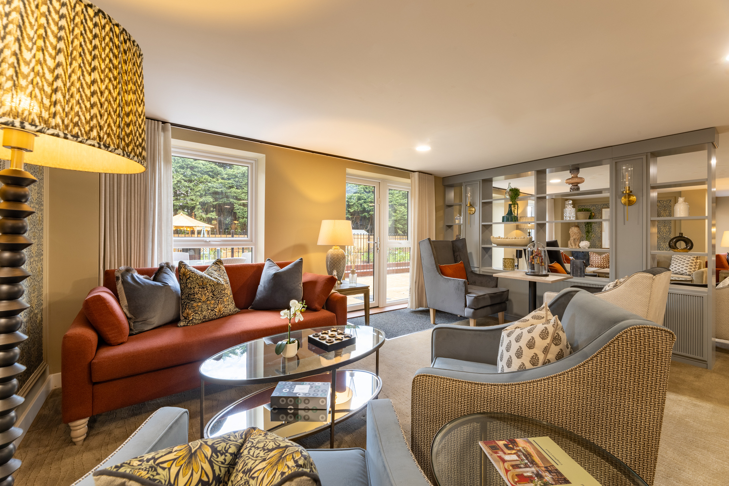 a living room with a large glass door