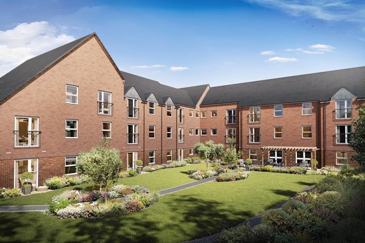 a brick building with a green lawn