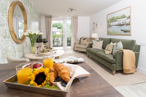a living room with a couch and a table