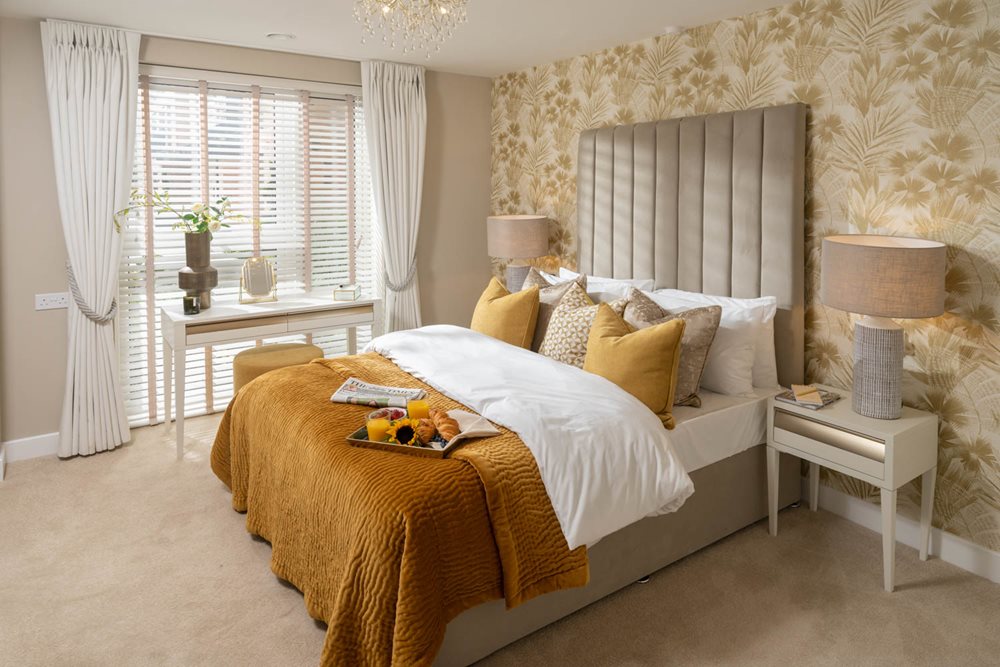 a bedroom with a bed and a table