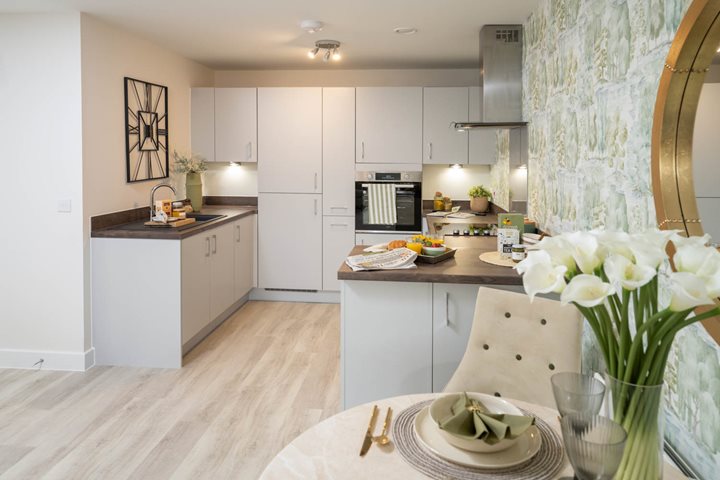a kitchen with white cabinets
