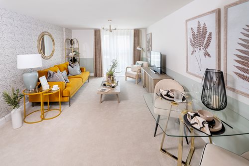 a living room with a yellow couch