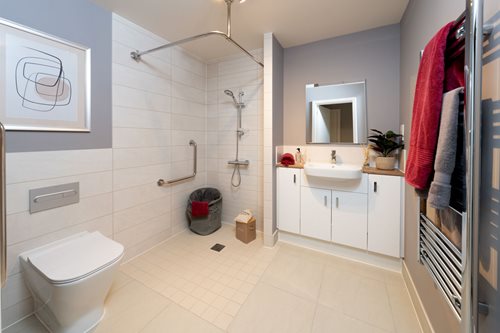 a bathroom with a toilet and sink