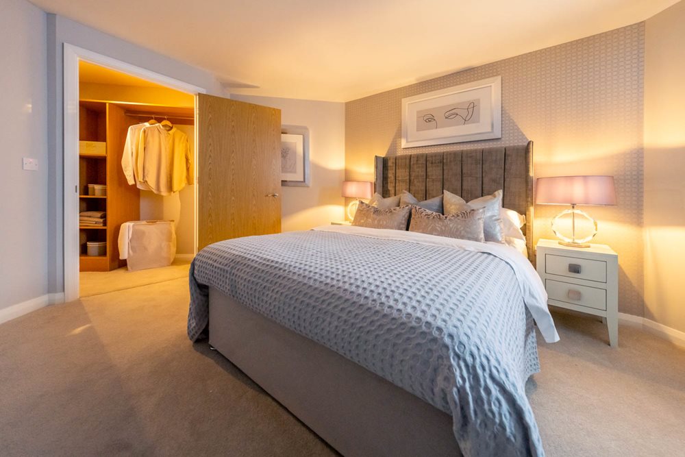 a bedroom with a bed and a closet