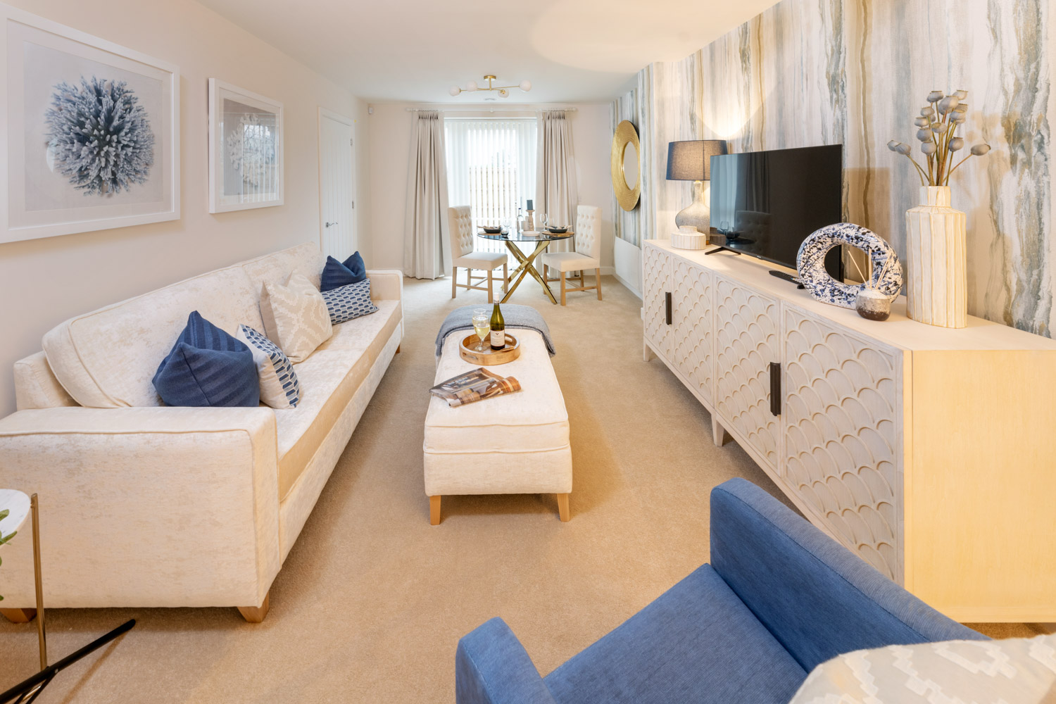 a living room with a couch and a tv
