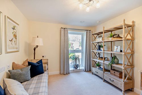 a living room with a bookcase