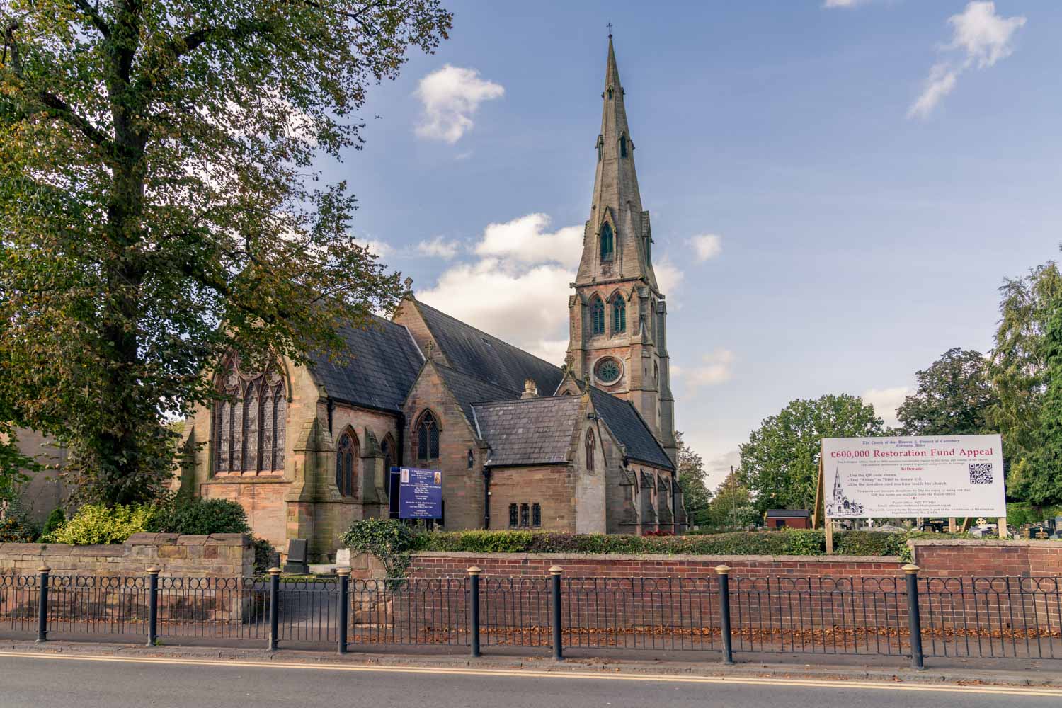 a church with a fence in front of it
