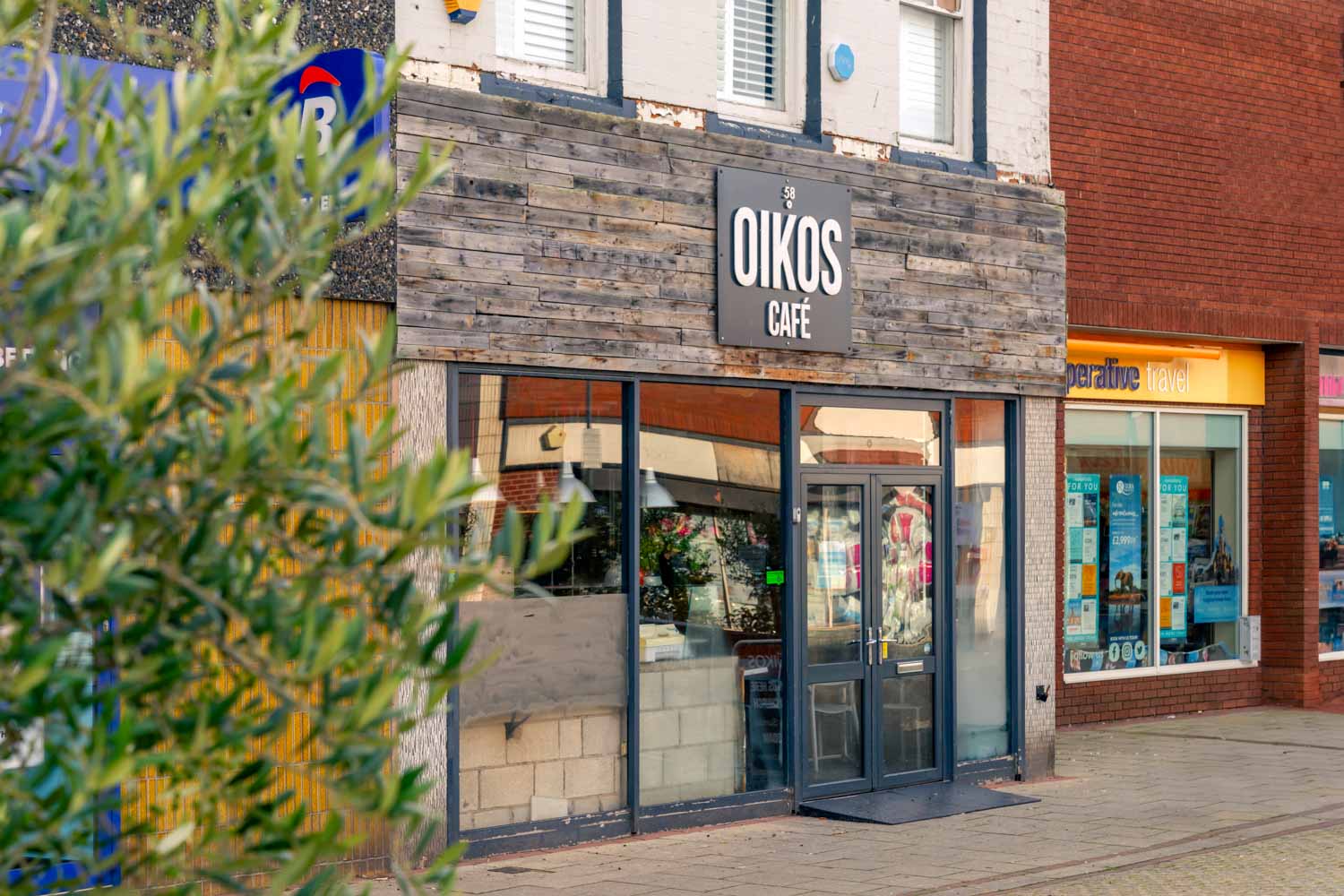 a store front with a sign