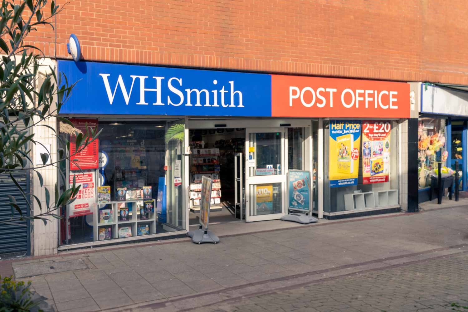 a store front with signs