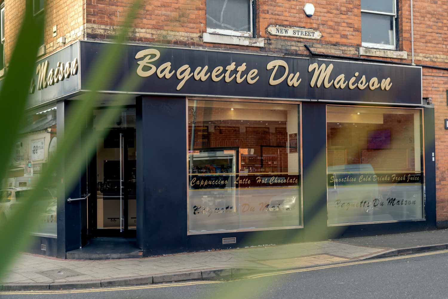 a store front with a sign