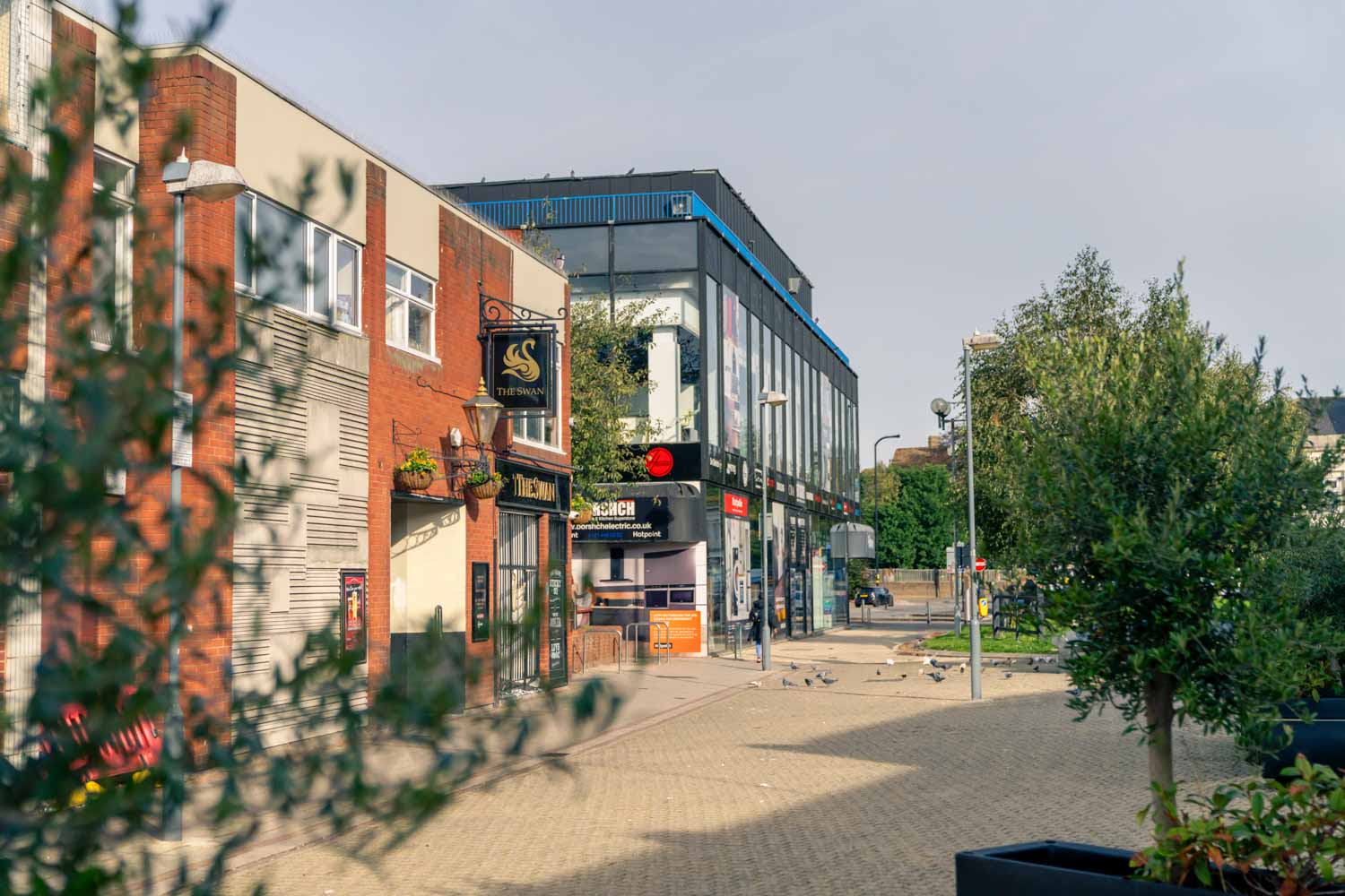 a street with buildings and trees