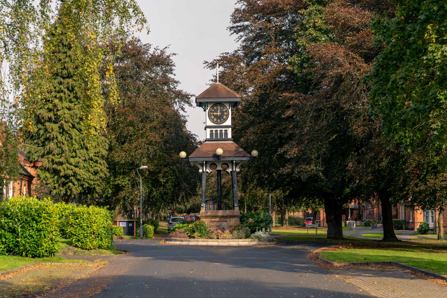 a clock tower in a park