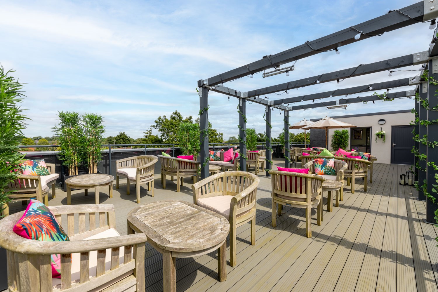a deck with chairs and tables