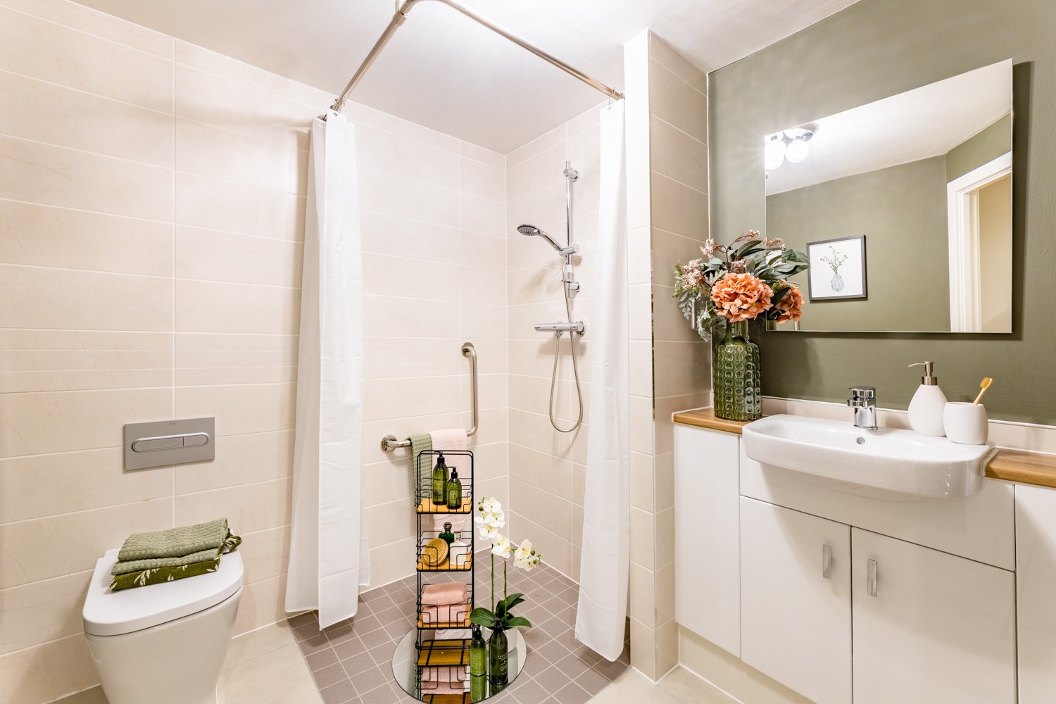 a bathroom with a shower and sink