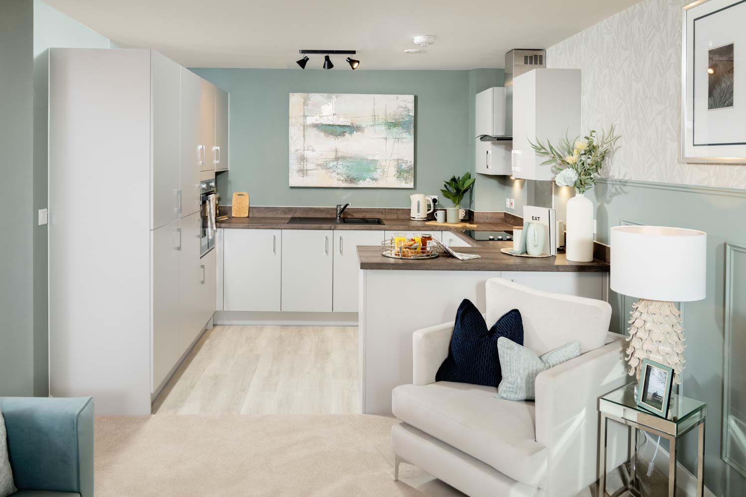 a living room with a white chair