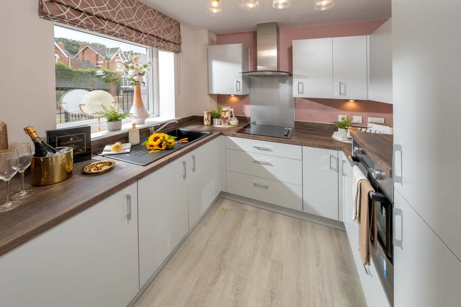 a kitchen with white cabinets