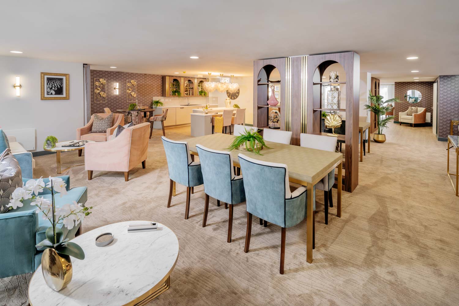 a large room with a dining table and chairs