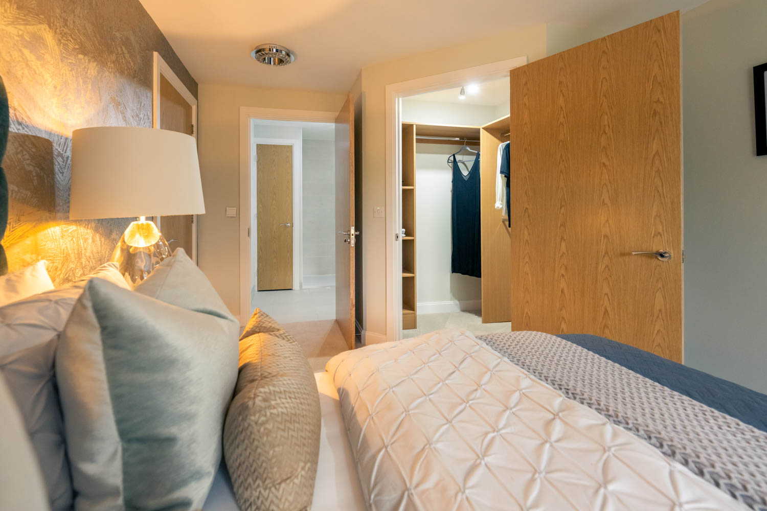 a bedroom with a bed and a closet
