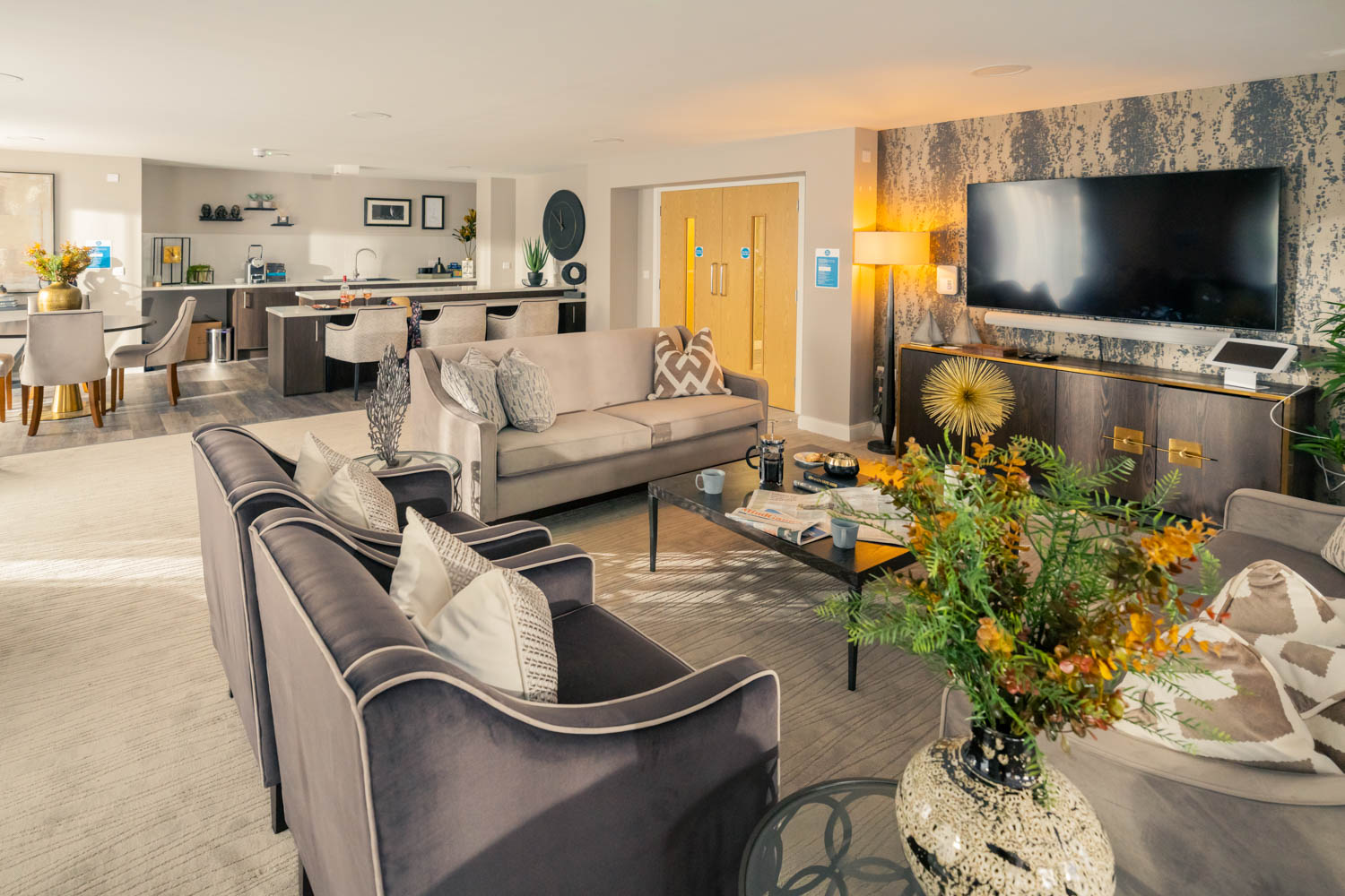 a living room with a large screen