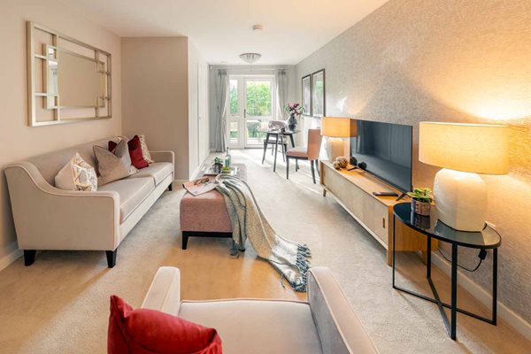 a living room with a couch and a television