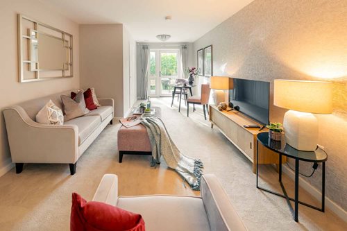 a living room with a couch and a television
